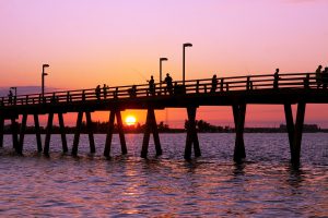 Fishing off the pier at sunset,Sarasota,Florida,USA.