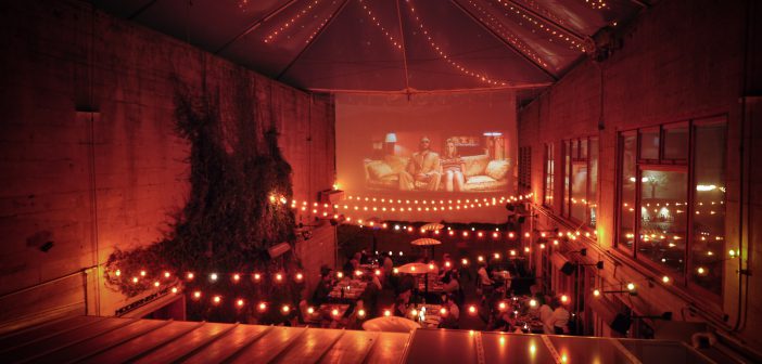 Guests can dine in Foreign Cinema’s outside courtyard while watching classic movies